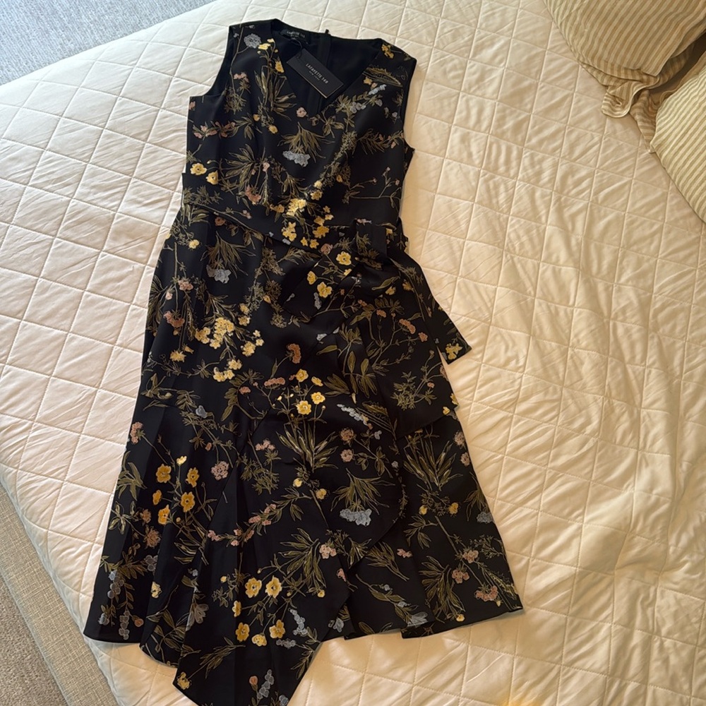Gorgeous never worn airy black dress w yellow and blue flowers.